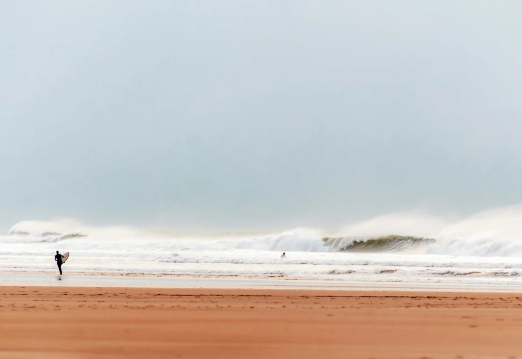 Surfing by the sea